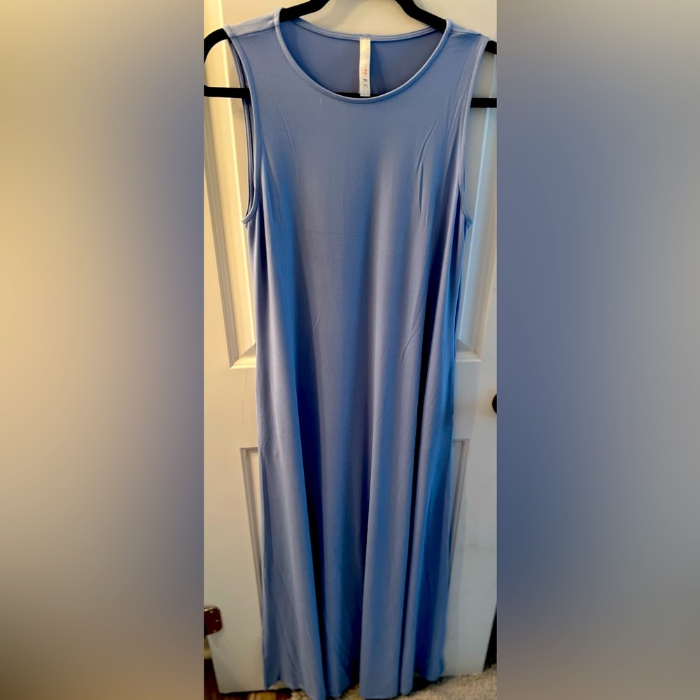 Buttery soft maxi dress with pockets in light blue.